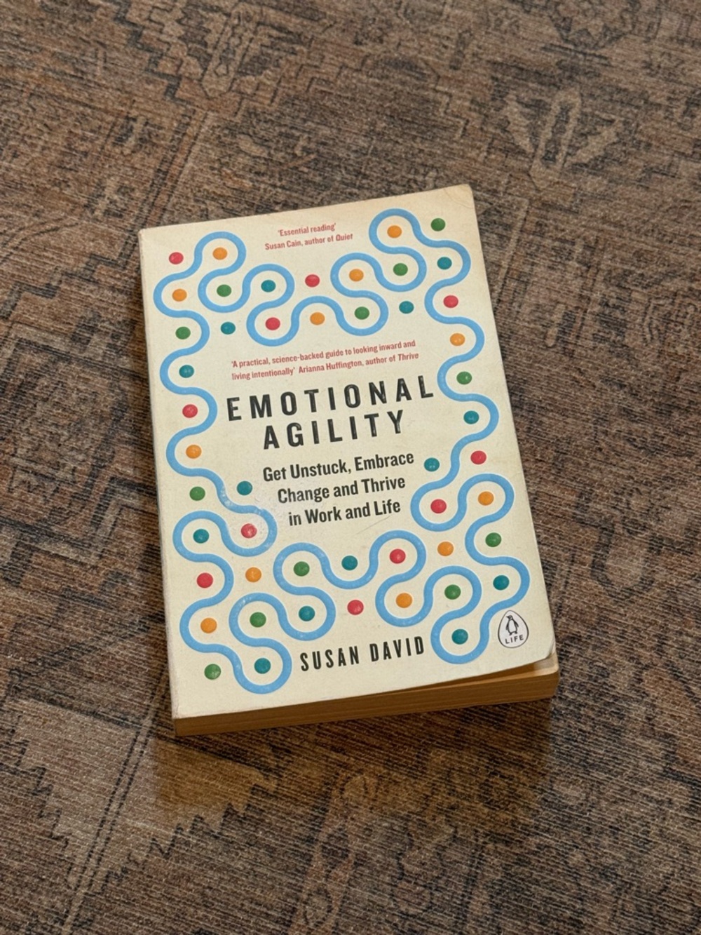 Emotional Agility by Susan David — Paperback Book in Cream with Colorful Accents